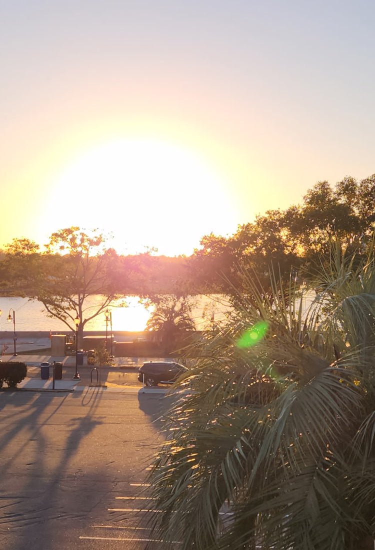 EZ Electric Bike Rentals Wilmington Sunset Tour image of a sunset over the river mobile image